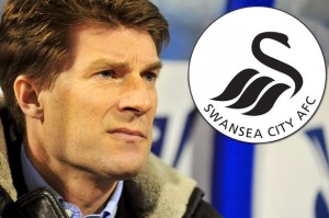 Swansea boss Michael Laudrup has guided his team to the brink of the Capital One Cup final with a 2-0 semi-final victory at Chelsea