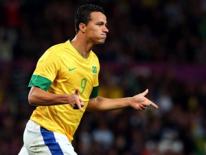Brazil international striker Leandro Damiao has thanked Tottenham Hotspur for showing a recurring interest in him, but insists that he is happy to stay at Internacional.