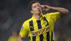 Dortmund want Bayern Munich to 'lift their cover' regarding their reported interest in Robert Lewandowski.