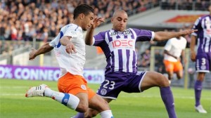 FC Barcelona have invited Toulouse defender Aymen Abdennour to the Camp Nou for the second leg of the club's Champions League tie with AC Milan.