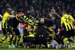 Dortmund celebrate their 3-2 victory over Malaga in the Champions League quarter-finals 