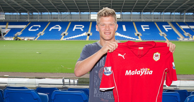 Denmark international striker Andreas Cornelius has completed a move from F.C. Copenhagen to Cardiff City on a five-year contract.