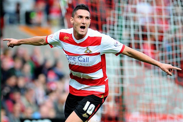 Doncaster Rovers have completed the signing of highly-rated Manchester United striker Federico 'Kiko' Macheda on a short-term loan deal.