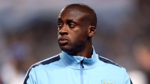 Manchester City midfielder Yaya Toure has played down speculation suggesting he is not happy at the Etihad Stadium.