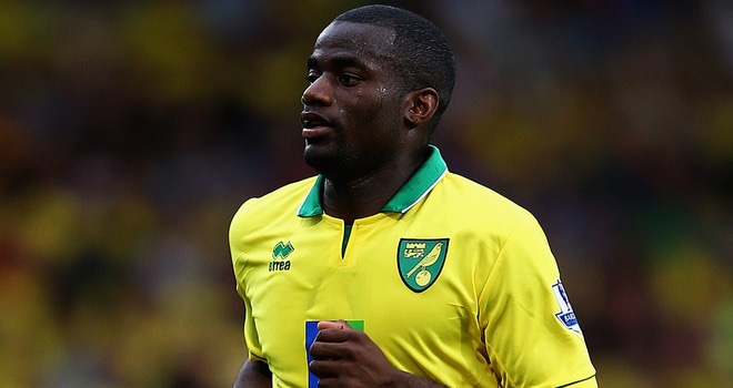Norwich City captain Sebastien Bassong has put pen to paper on a new two-and-a-half-year deal at Carrow Road.