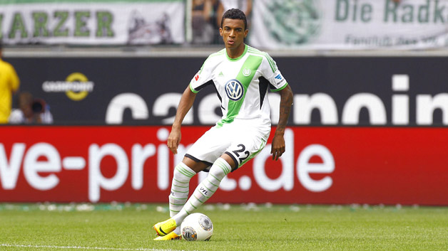 VfL Wolfsburg midfielder Luiz Gustavo has welcomed reports linking him with a move to Spanish champions Barcelona.