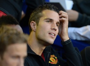 Robin van Persie scored a hat-trick to take Manchester United through to the Champions League quarter-finals