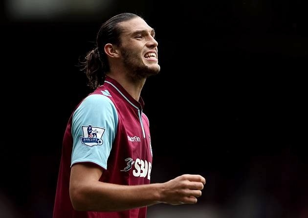 West Ham United striker Andy Carroll is prepared to fight for a place in the Hammers' first-team when he returns from injury.