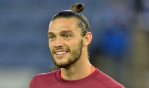 England striker Andy Carroll scored the fourth goal to seal West Ham's win at Swansea on Boxing Day